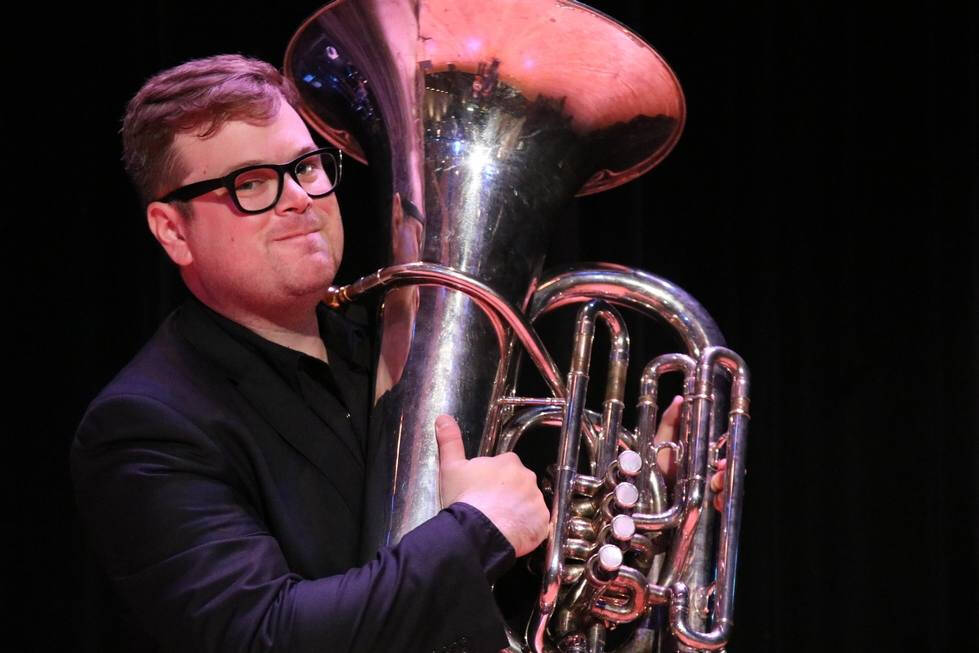 paul carlson holding tuba